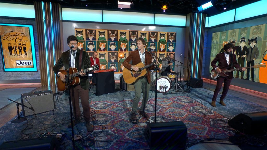 Michael Montali and Fantastic Cat perform on CBS Saturday Morning
playing guitars